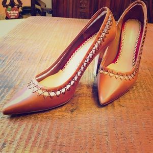 Tan heels with netting and cross stitch detail.